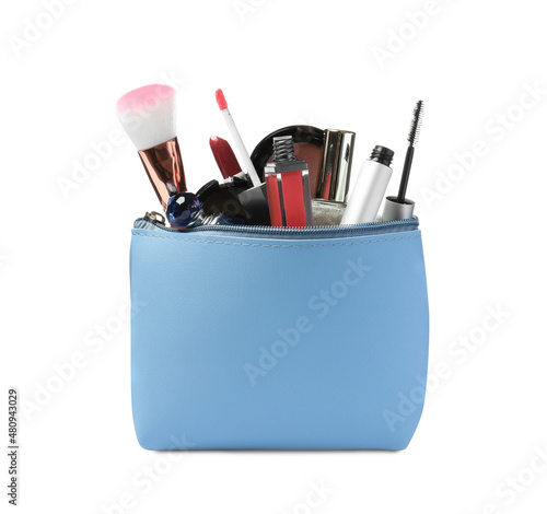 Stylish light blue cosmetic bag with makeup products on white background