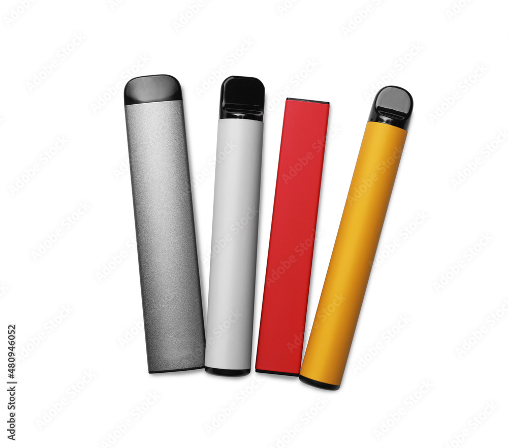 Different electronic cigarettes on white background, top view Different electronic cigarettes on white background, top view