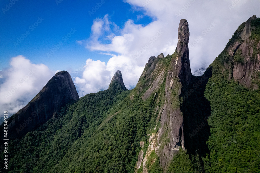 Graphic image from Postcard Trail view in Teresópolis with God's Finger peak part of rainforest mountainous vegetation in Rio de Janeiro Atlantic woods. Adventure hiking and outdoor sports in Brazil.