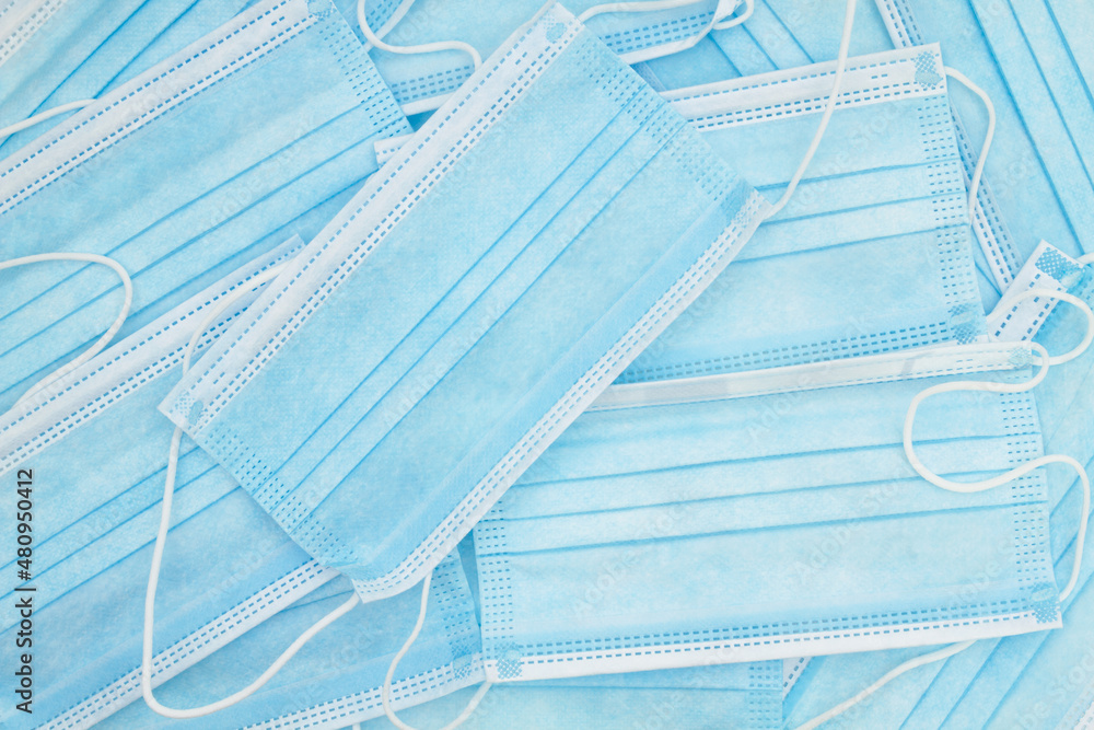 Фотография Disposable surgical face mask background