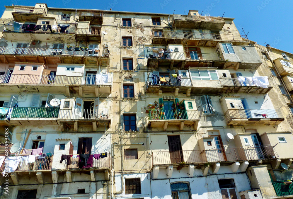 Bastia, Corsica, France, 18.06.2019. House facade of a traditional town building. Bastia, Corsica, France, 18.06.2019. House facade of a traditional town building.