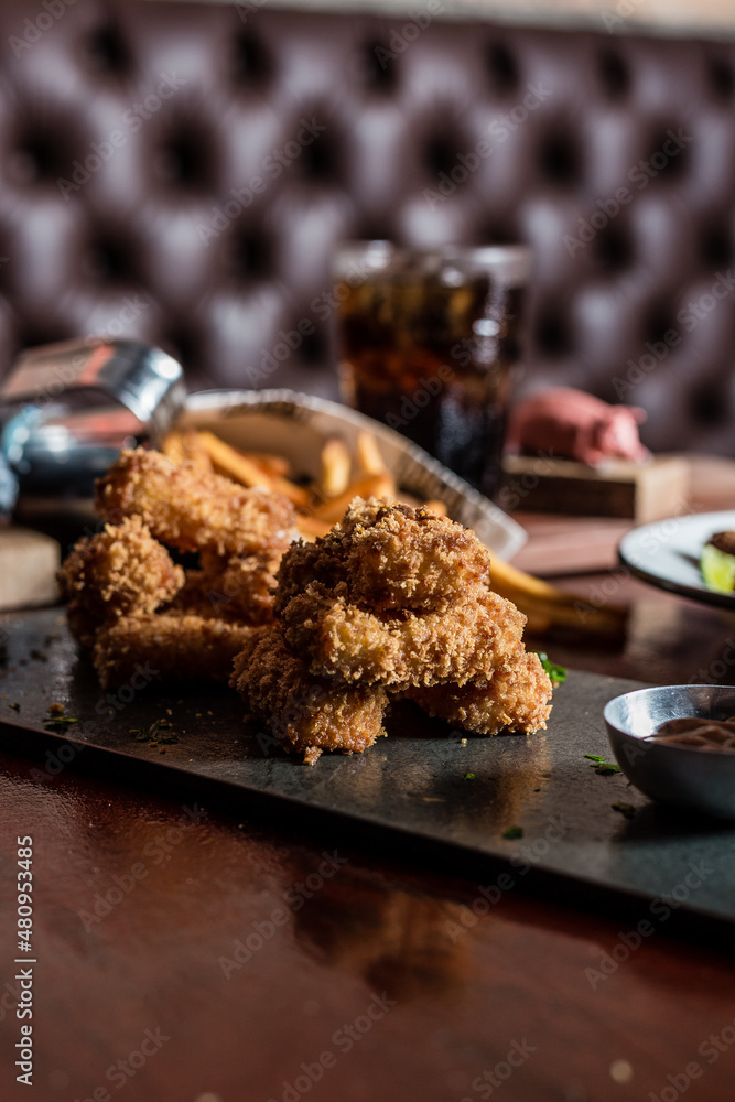 Fototapeta premium Perfect Burger Fried Chicken French Fries Bacon Barbecue Sauce Onion Rings Fast Food