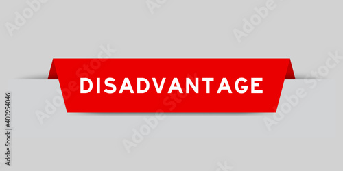 Red color inserted label with word disadvantage on gray background