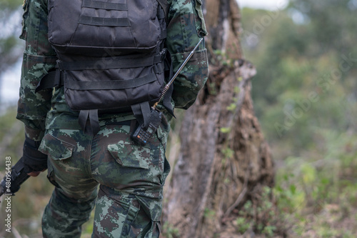 close up soldiers with gun.