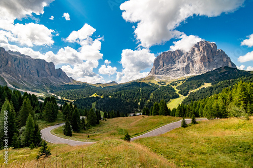 View of Sassolungo Langkofel mountain from Selva. Gardena Pass, Trentino Alto Adige, Italy. Gardena Pass with Sassolungo Passo Gardena, alpine pass between Val Badia and Val Gardena, South Tyrol Italy