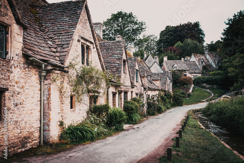 traditional Cotswold cottages in England  UK. Bibury is a village and civil parish in Gloucestershire  England. photo