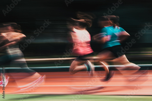Fotografie blurred image of runners in a competition