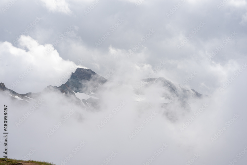 Alpine mountains in Austria. Grosglockner road in fog