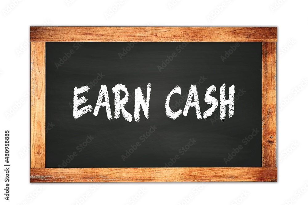 EARN CASH text written on wooden frame school blackboard. EARN CASH text written on wooden frame school blackboard.