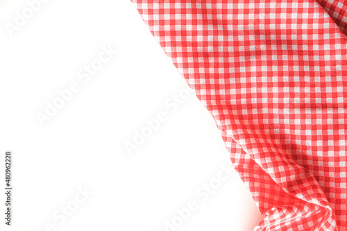 crumple pink plaid fabric or tablecloth on white background with copy space. 