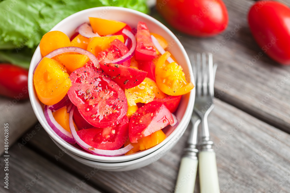 Salad with fresh vegetables, colorful tomatoes, onions and spices. Healthy food Salad with fresh vegetables, colorful tomatoes, onions and spices. Healthy food