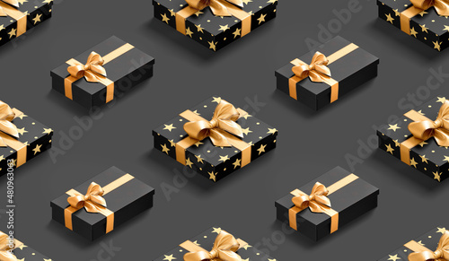 Black gift box with gold bow seamless pattern, dark background