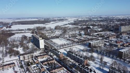 Winter aerial view of a snow covered residential community in Zwolle, Netherlands