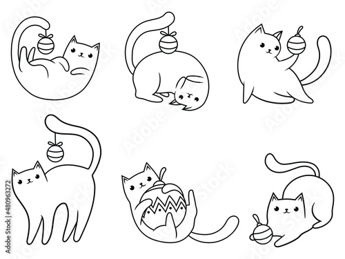 Set of Christmas playful cat. Collection of cute different holiday kitten with  tree toys. Happy New Year. Vector illustration for holiday cards.