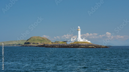 Lismore lighthouse on Eilean Musdile in the Firth of Lorne at the entrance to Loch Linnhe, Hebrides, Scotland, UK photo
