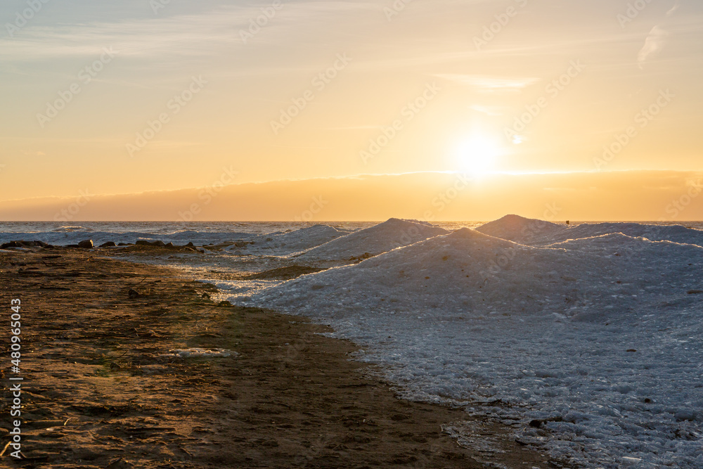 Ice piles at the Baltic sea in Tuja beach in sunset in January in Latvia Ice piles at the Baltic sea in Tuja beach in sunset in January in Latvia