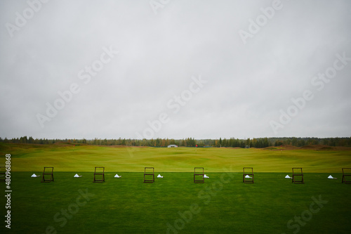 Golf range on green field