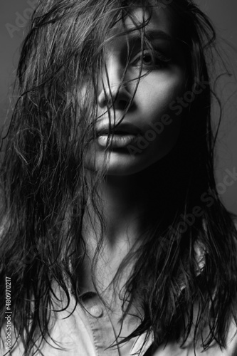 Young wet woman black and white portrait