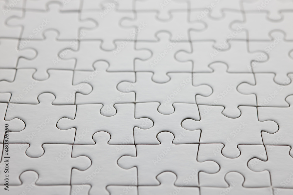 close-up empty white puzzle background with copy space close-up empty white puzzle background with copy space