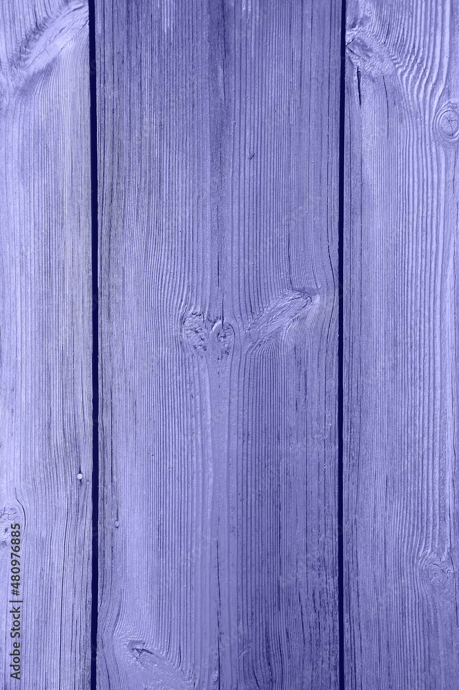 The most trending color of 2022. Very peri. The texture of wooden boards. Background The most trending color of 2022. Very peri. The texture of wooden boards. Background