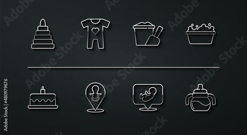 Set line Pyramid toy, Cake with burning candles, Baby bathtub, dummy pacifier, clothes, bottle and Sand bucket shovel icon. Vector