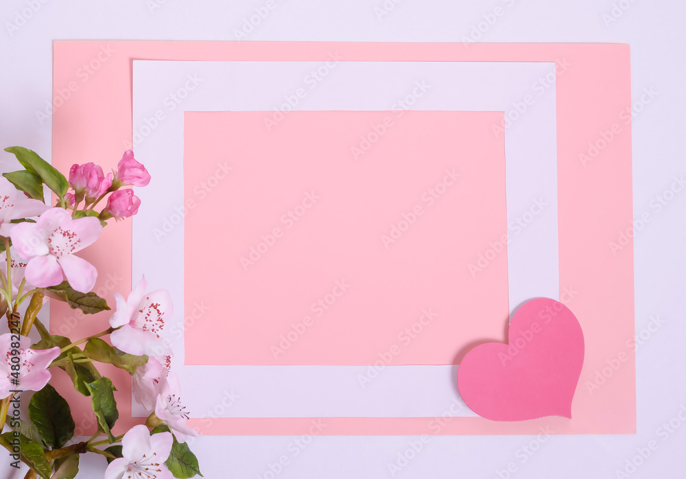 Pink background card for Valentines day with copy space, white frame with hearts and flowers