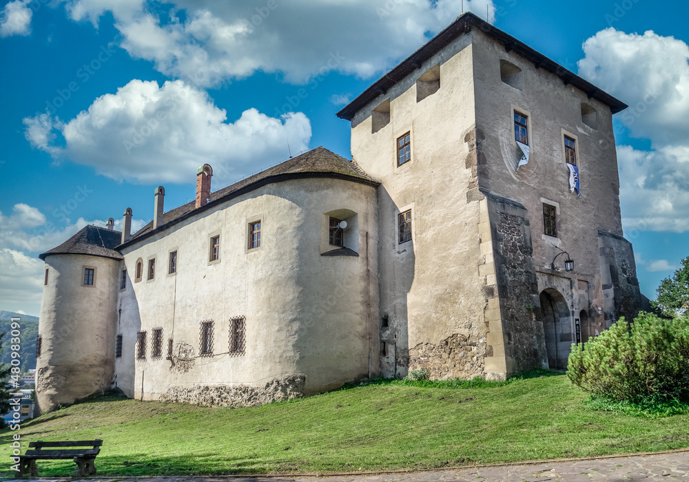 Aerial view of Zvolen castle in Slovakia with Renaissance palace, outer ring of wall, turrets, corner tower, massive gate tower, Gothic Chapel