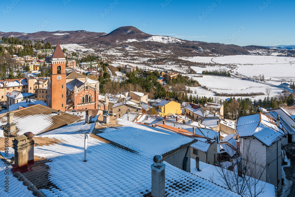 The beautiful village of Rivisondoli covered in snow during winter time. Abruzzo, central Italy.