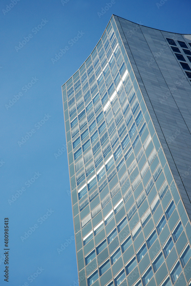 Skyscraper texture background on blue sky Skyscraper texture background on blue sky