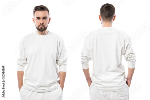 Handsome man wearing white long-sleeved t-shirt with empty space for design