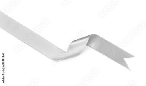 Silver satin ribbon on white background, top view