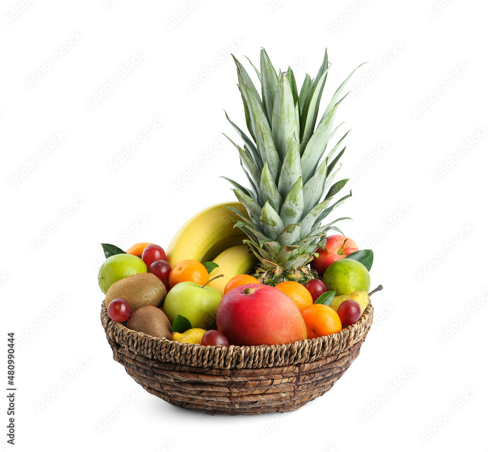 Assortment of fresh exotic fruits in wicker bowl on white background Assortment of fresh exotic fruits in wicker bowl on white background