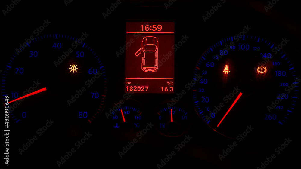 Fototapeta premium car speedometer and tachometer at night