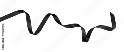 Elegant black ribbon isolated on white, top view photo