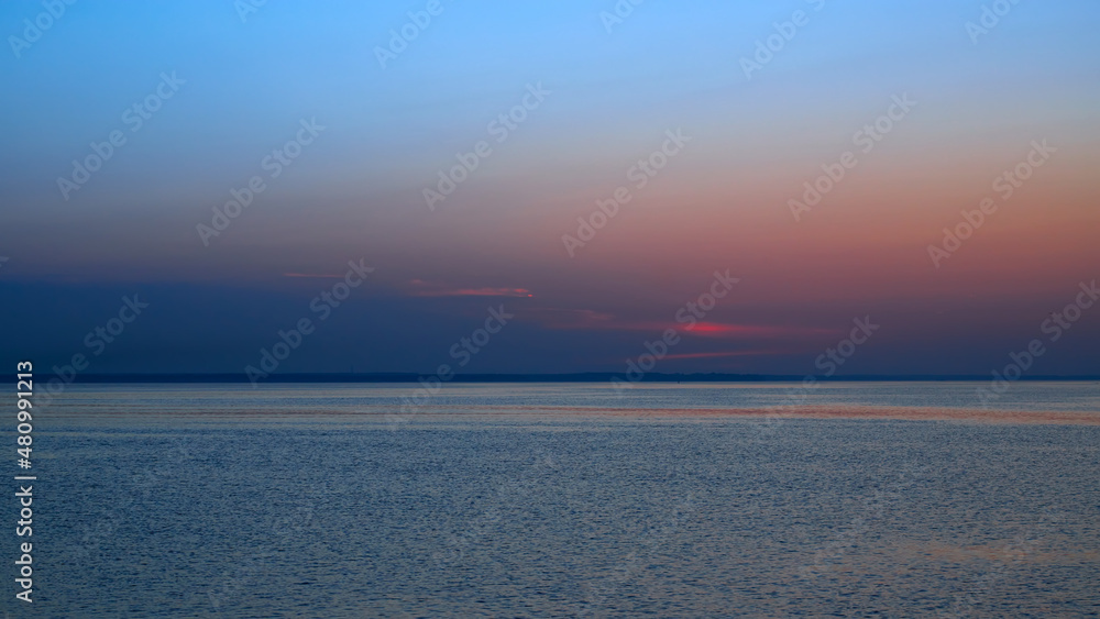 Beautiful summer sunset on the sea. Sea landscape.