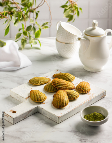 Wallpaper Mural Homemade traditional french madeleine cookies with matcha tea, sweet dessert and tea on the table. menu concept Torontodigital.ca