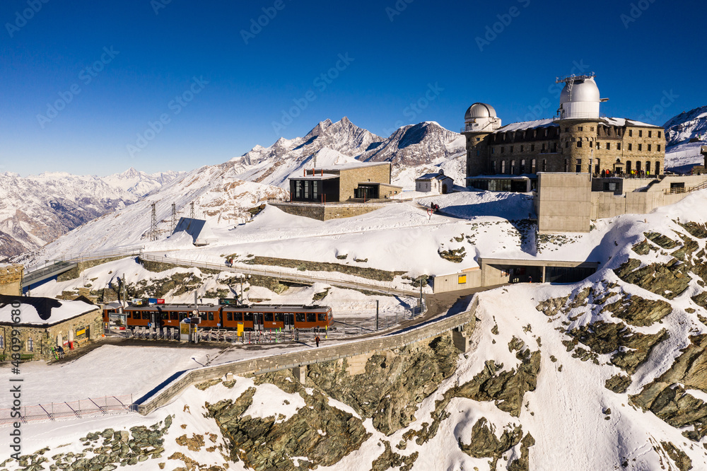 Aerial view of the famous Gornergrat ridge and train station in Zermatt in the alps in Switzerland on a sunny winter day
