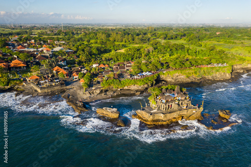 Aerial view of the famous Balinese Hindu Tanah Lot temple in Bali, Indonesia. photo