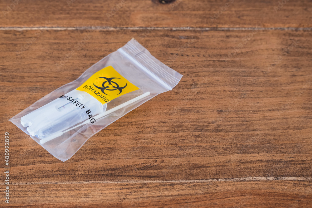biohazard sachet for throwing away covid19 test results Stock Photo Adobe Stock
