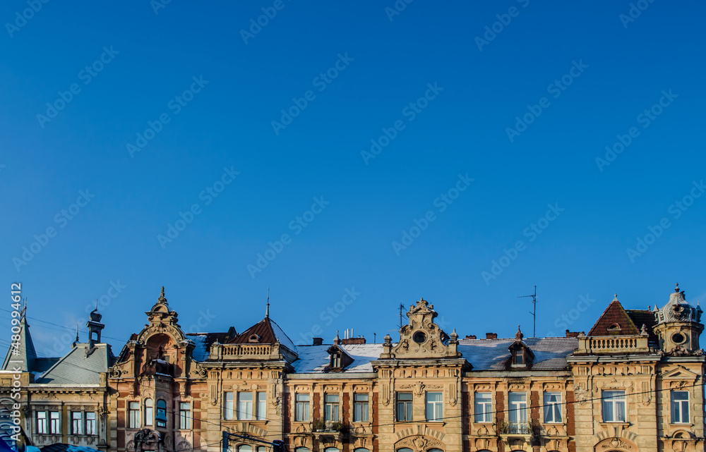 Ancient historic houses on a background of blue sky.