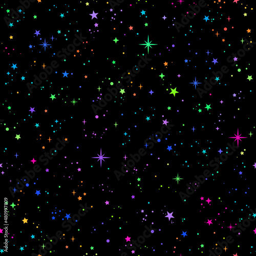 seamless background with bright rainbow stars