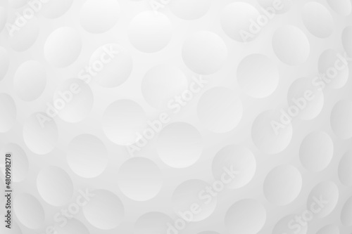 Golf ball texture background. White honeycomb background. Realistic representation of a golf ball texture close up. A macro part of a plastic golf ball.
