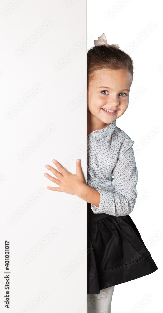 A beautiful cute child with a white board in hands A beautiful cute child with a white board in hands