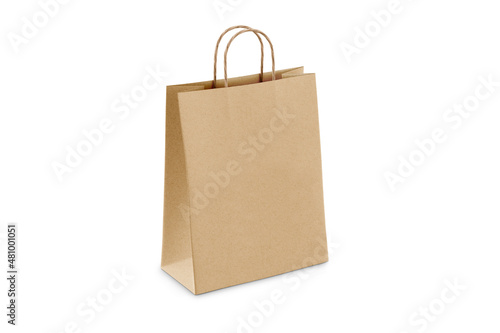 Brown craft small paper bag packaging template isolated on white background. Stand-up pouch side view package. Brown shopping bag mockup. Package with handle for shopping, advertising and branding.