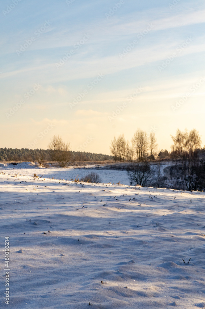 Beautiful snowy winter landscape with white field Beautiful snowy winter landscape with white field