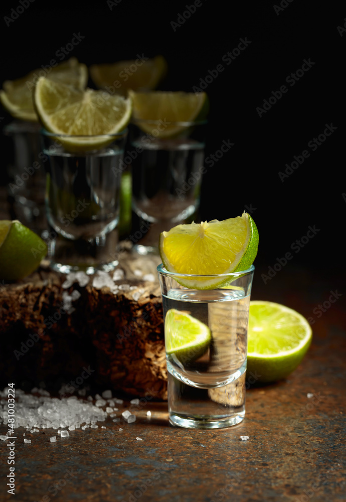 Tequila shots with lime and salt. Tequila shots with lime and salt.