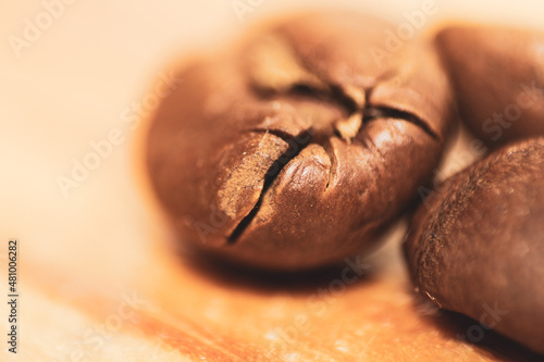 macro shot of coffee beans with selective focus on a crack