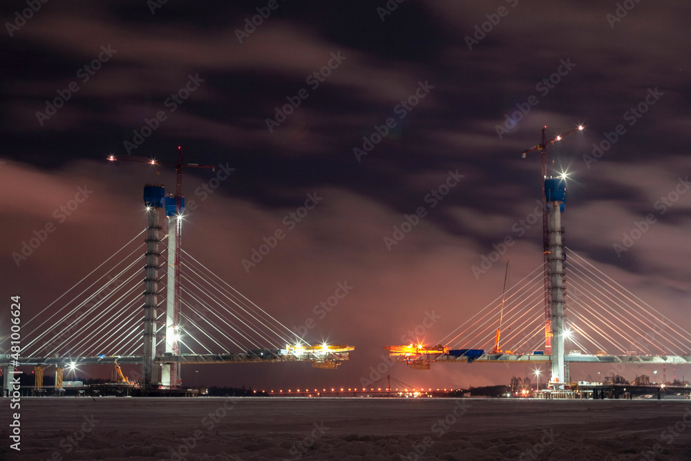 Fototapeta premium Building a bridge across a river