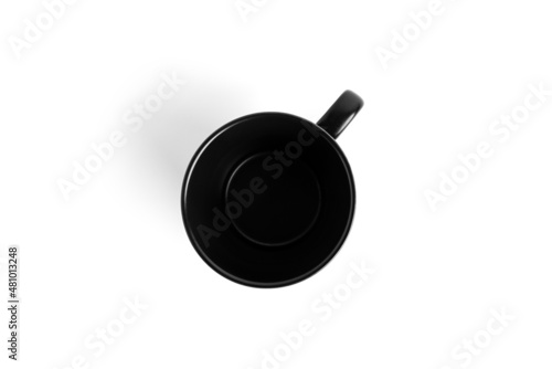 Black tea cup for drink isolated on white background. Ceramic coffee cup or mug close up.