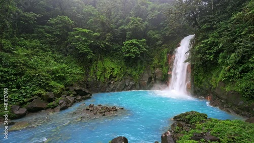 Catarata Rio Celeste, waterfall of blue river Rio Celeste, Parque Nacional Volcan Tenorio, Costa Rica, Central America photo